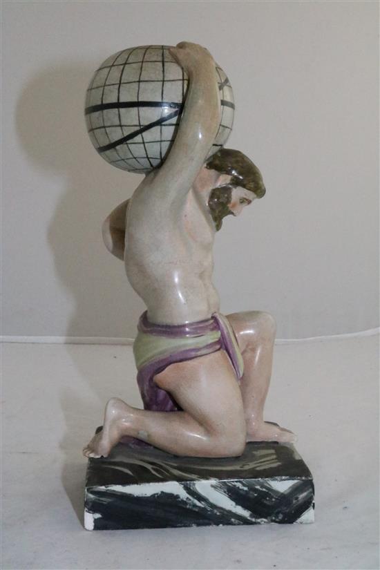A Enoch Wood type pearlware figure of Atlas supporting a globe on his shoulder, c.1810, 24cm (9.5in.), restorations